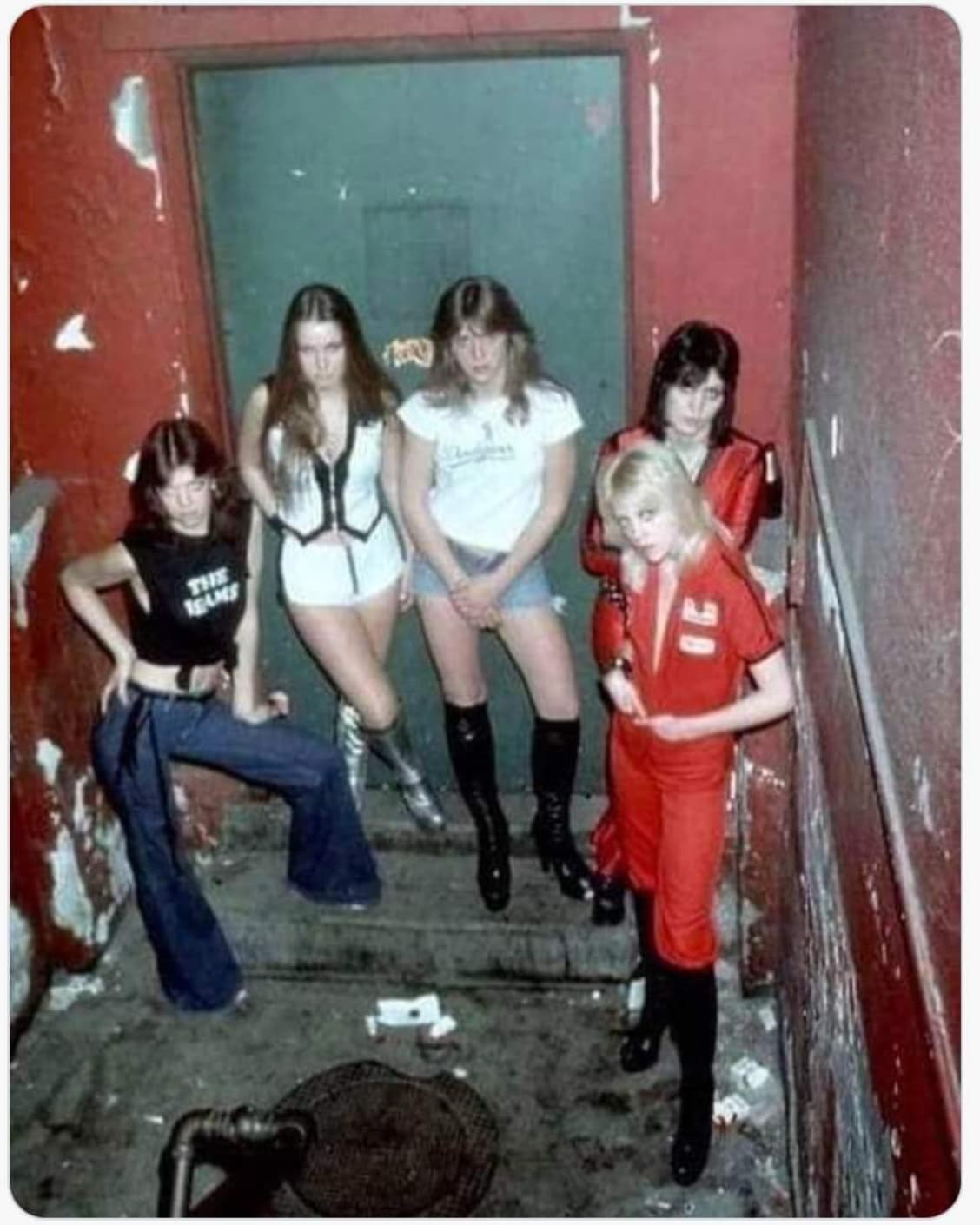 The Runaways pose for a photo behind The Rathskeller, a now-bygone Boston venue in March 1977. 
